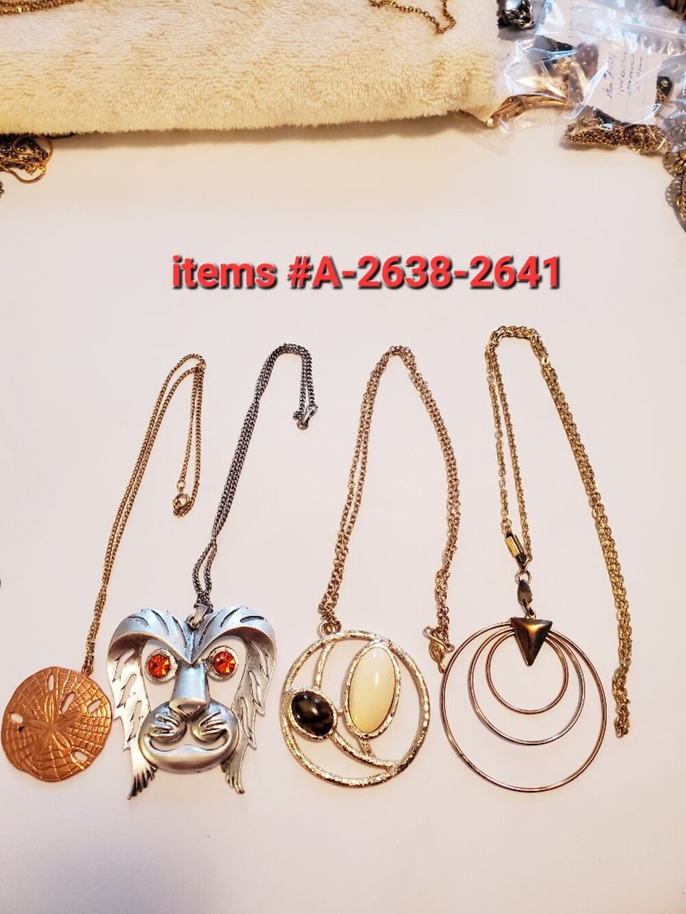 4 Necklaces with pendants, items # A-2638-2641, . wt. 114 grams.